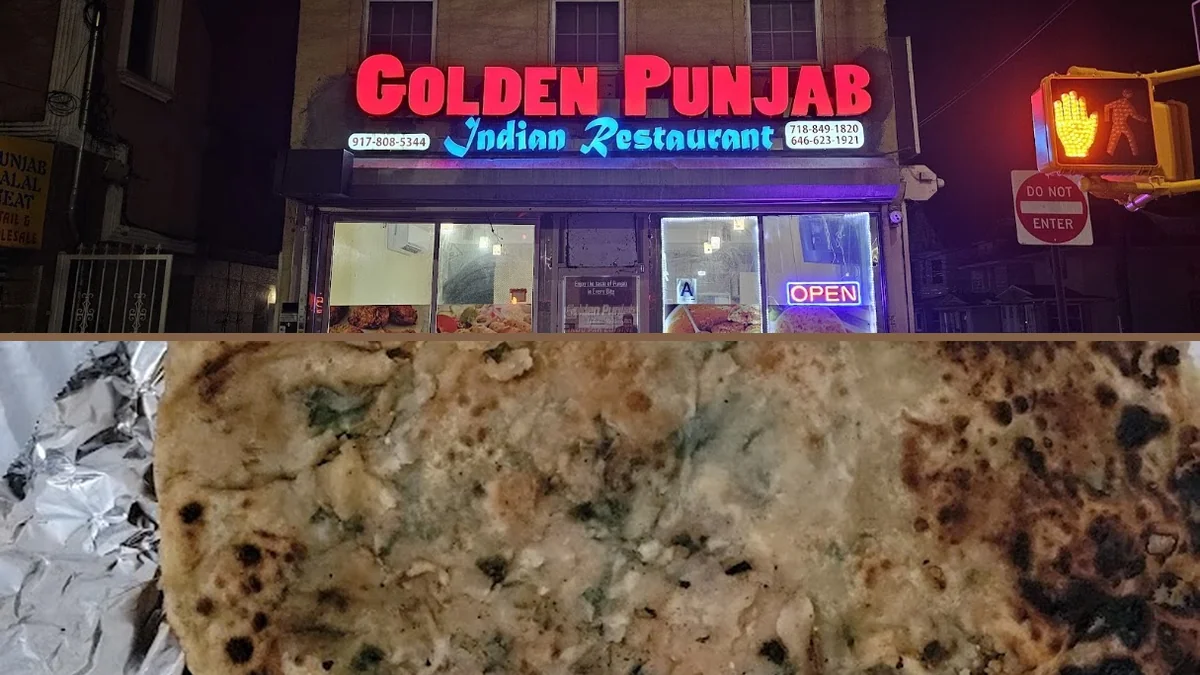 Indian dishes arranged on a casual restaurant table.
