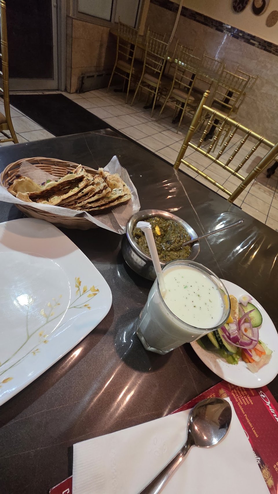 Menu page listing curry and grilled specialties.